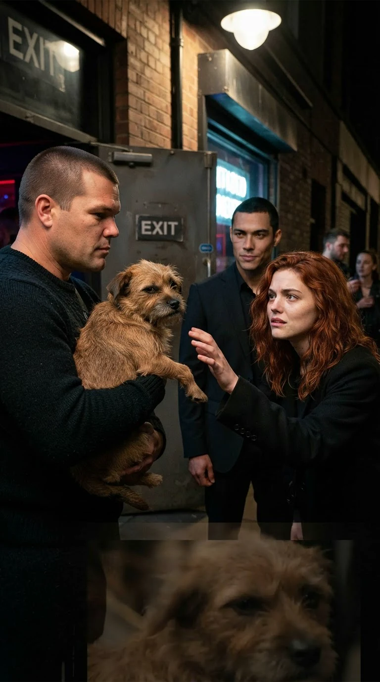 Sandro holds Tater under one arm while Winnie reaches for the dog.