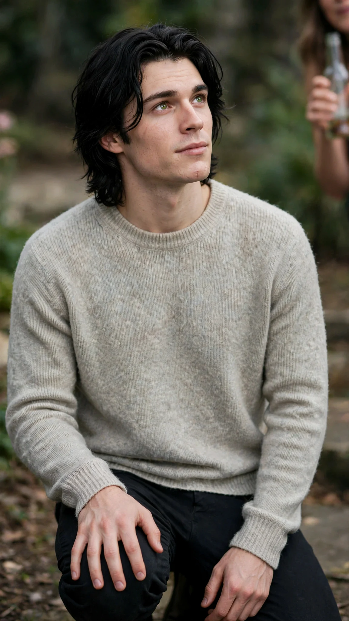 Finn looks up at her, serious, still kneeling with his hands on his knee.